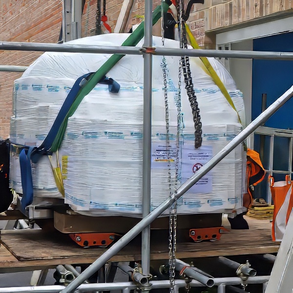 pizza oven moving with a spider crane